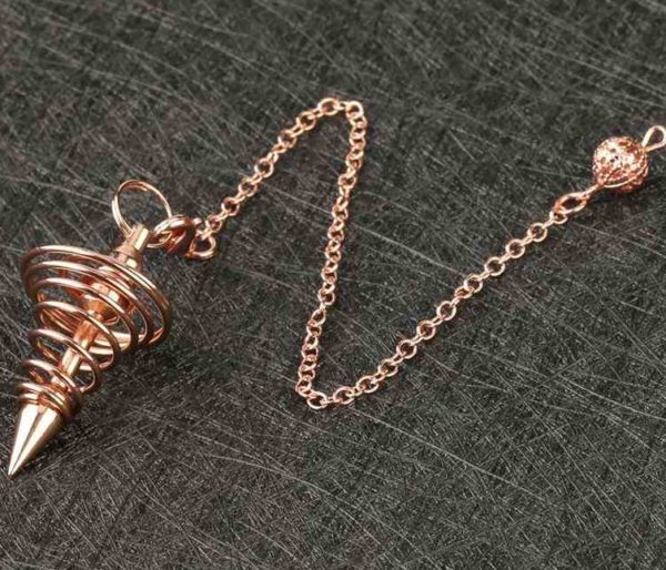Pendule en métal Spirale cuivre doré rose